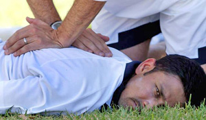 Anil Kumble being attended to by the physio